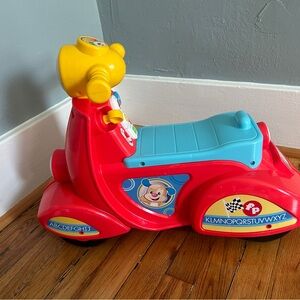 Red and Blue Ride-On Toy Car